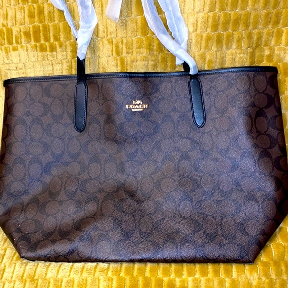 Coach Handbags - Coach brown and black signature tote